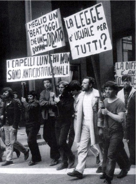 Eros Alesi carrying a sign that reads 'Is the law equal for all?'. Melchiorre Gerbino is next to Eros Alesi The demonstration while proceeding along Corso Vittorio Emanuele